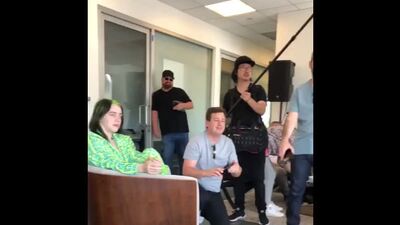 Billie, claudia and more celebrating finneas at the @kobalt offices today in los angeles