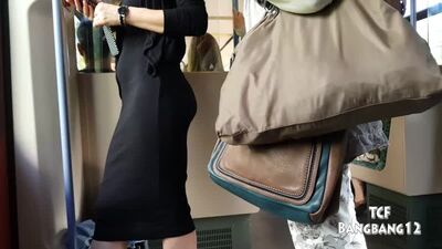 Candid MILF in seethru black dress_low