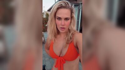 WWE - CJ Perry aka Lana in orange bikini