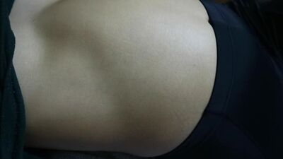 Asian girl's huge sloshy belly